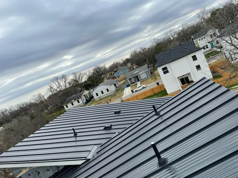 Standing seam metal roof panels with vents for Skylight Repair in Alamosa